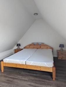 מיטה או מיטות בחדר ב-Jelle-von-der-Welle
