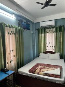 Postel nebo postele na pokoji v ubytování Hotel Quality