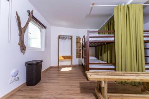 Postel nebo postele na pokoji v ubytování Olá Vida - Hostel Caminha