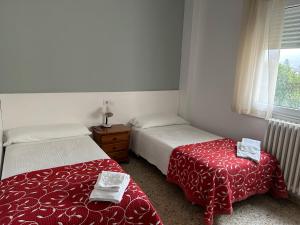 Łóżko lub łóżka w pokoju w obiekcie Pazo Pias P