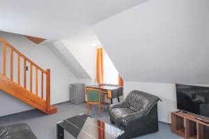 Posezení v ubytování Hotel garni Zwickau-Mosel