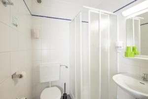 Koupelna v ubytování Hotel garni Zwickau-Mosel + 32 fotografií