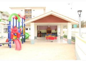 a play yard with a playground with a slide at Remarkable 3-Bed Apartment in Viana in Viana