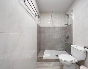 Koupelna v ubytování Stay U-nique Apartments GranDeGracia