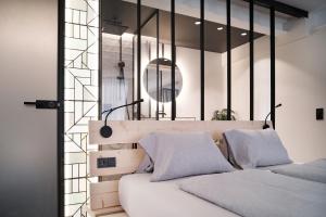 Letto o letti in una camera di Grand Pension Franziska - inkl CrossFit Gym
