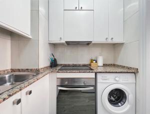 Kuchyň nebo kuchyňský kout v ubytování Stay U-nique Apartments GranDeGracia
