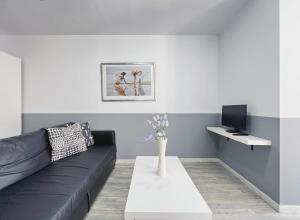 TV a/nebo společenská místnost v ubytování Stay U-nique Apartments GranDeGracia