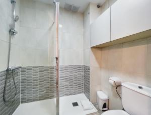 Koupelna v ubytování Stay U-nique Apartments GranDeGracia