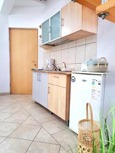 Taboo Duplex Apartments tesisinde mutfak veya mini mutfak