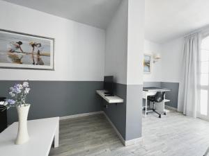 TV a/nebo společenská místnost v ubytování Stay U-nique Apartments GranDeGracia