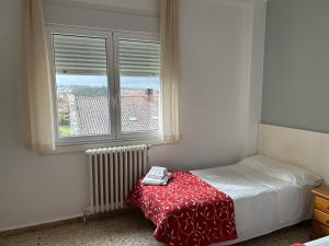 Łóżko lub łóżka w pokoju w obiekcie Pazo Pias P