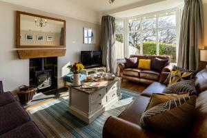 Televisyen dan/atau pusat hiburan di Tegfryn (Sleeps 8), 5*, Sea View, Borth y Gest
