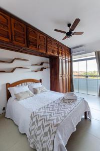 Postel nebo postele na pokoji v ubytování Excelente apartamento no melhor point de Itaúna a 100 m da praia + 34 fotografií