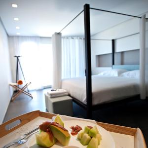 Voodi või voodid majutusasutuse Orizontes View Hotel toas
