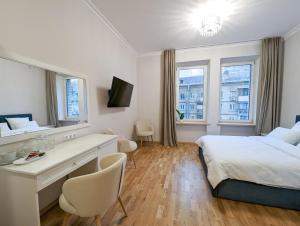 Postel nebo postele na pokoji v ubytování Kyiv Honchara Hotel