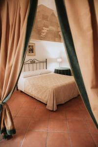 レッチェにあるDimora Santangeloのベッドルーム1室(ベッド1台付)