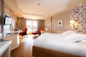 Postel nebo postele na pokoji v ubytování La Clairière bio & spahotel + 37 fotografií