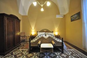 Postel nebo postele na pokoji v ubytování Felline In Bed&Breakfast Dimora di Charme el Salento + 37 fotografií