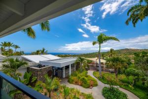 an aerial view of a building with palm trees at Latitude 21 in Saint-Gilles-les-Bains