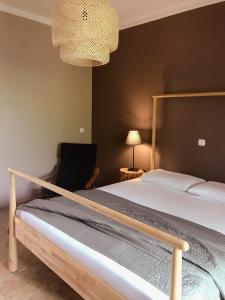 A bed or beds in a room at Agrilia Maison Még 32 kép