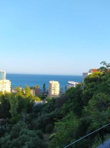 a view of a city with the ocean in the background at Benalmadena new terraced house 3 bedroom 2,5 bathroom in Benalmádena