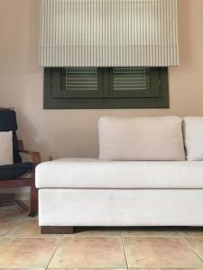A seating area at Agrilia Maison