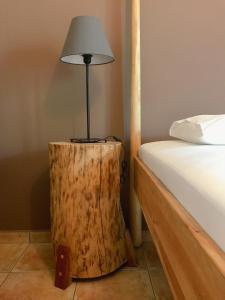 A bed or beds in a room at Agrilia Maison