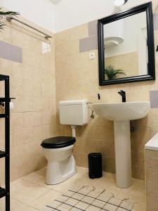 Kúpeľňa v ubytovaní Charm Boutique Apartment