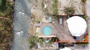 an aerial view of a house with a boat on a deck at ozlifesapanca dome in Sapanca