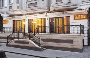 a building with a staircase in front of a store at Lovely central 1BR apartment with a balcony in Chişinău