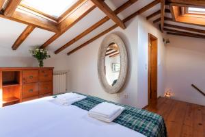 Postel nebo postele na pokoji v ubytování Casa Pequena by LovelyStay