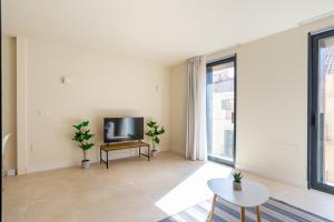 Televízia a/alebo spoločenská miestnosť v ubytovaní Urbe10 Carreteria Big Terrace Suite