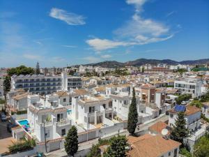 an aerial view of a city with white buildings at Nerja Paradise Rentals - Villa Topaz in Nerja