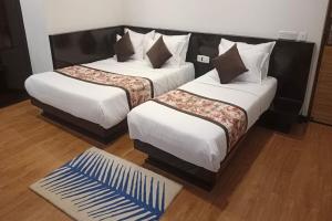 Hotel Ninamma客房内的一张或多张床位