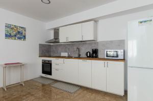 Kuchnia lub aneks kuchenny w obiekcie YourHouse Ca Na Mosseta