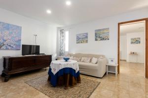 Telewizja i/lub zestaw kina domowego w obiekcie YourHouse Ca Na Mosseta
