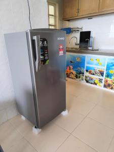 a stainless steel refrigerator in a kitchen at Fraser Hill Silverpart Resort A3-6-3A Best View With Lift in Bukit Fraser