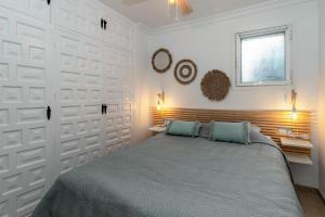 Postel nebo postele na pokoji v ubytování Arce 11 Torrecilla Beach Casasol