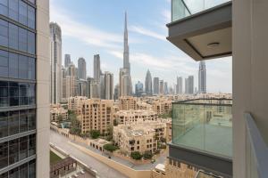 a view of the city from a building at Waves Holiday Home - Chic Apartment With Dubai Skyline Views in Dubai