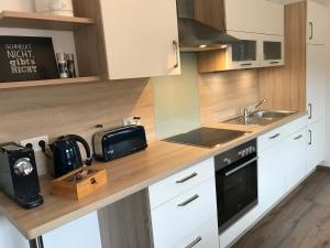 Kuchyň nebo kuchyňský kout v ubytování Appartementhaus Angelika