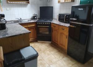 Kuchyňa alebo kuchynka v ubytovaní Magyar Lovasvendégház