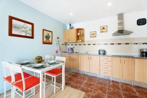 Kuchyň nebo kuchyňský kout v ubytování Apartamento P Armonia Rural