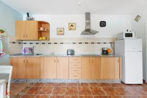 Kuchyň nebo kuchyňský kout v ubytování Apartamento P Armonia Rural