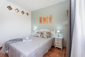 Postel nebo postele na pokoji v ubytování Apartamento P Armonia Rural