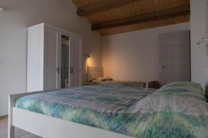 Postel nebo postele na pokoji v ubytování B&B La Casa Gialla