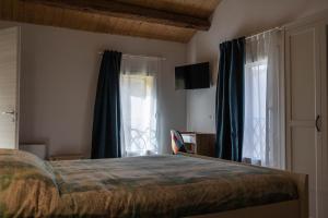 Postel nebo postele na pokoji v ubytování B&B La Casa Gialla