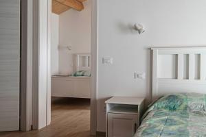 Postel nebo postele na pokoji v ubytování B&B La Casa Gialla