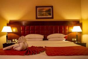 Postel nebo postele na pokoji v ubytování Grand Central Hotel