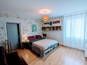 Posteľ alebo postele v izbe v ubytovaní Gîte au coeur du vignoble de Cahors, 5 chambres + 22 fotografií