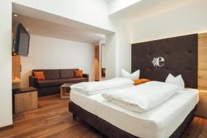 Posteľ alebo postele v izbe v ubytovaní Hotel Edelweiss Superior